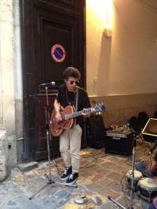 A young kid bangs out some Nirvana on Rue des Francs Bourgeois ©Lisa Anselmo