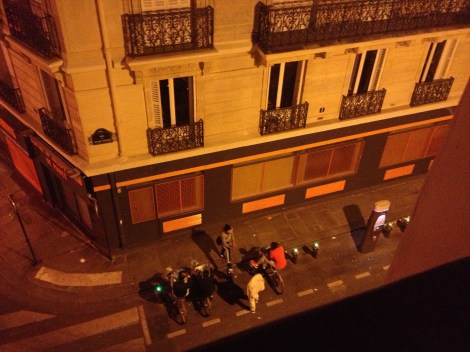 Every night these same five guys hang out on the Velib bikes, beneath my window, talking and drinking until 3AM. One guy loves to ring the little bell on the bike—over and over and over. ©Lisa Anselmo