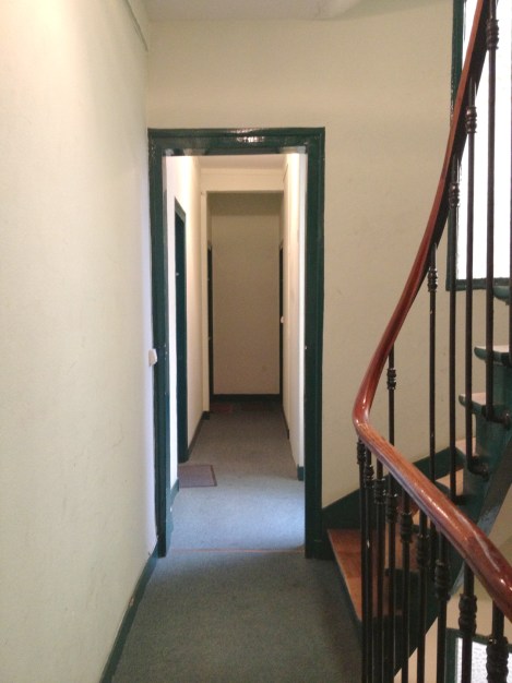 The hallways of my newest digs remind me of the tenements of Manhattan's East Village. ©Lisa Anselmo