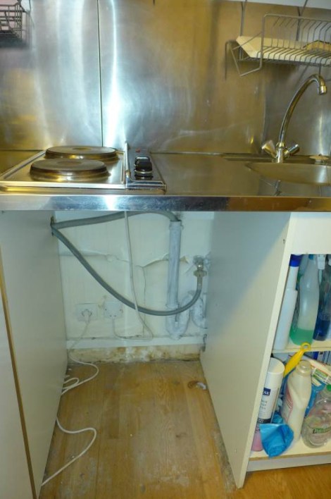 Water damage creeps into my kitchen a year later.