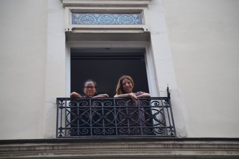Vân Nguyen of Nomadic Frames taking a break with me on the balconette of my apartment. ©2015 Nomadic Frames
