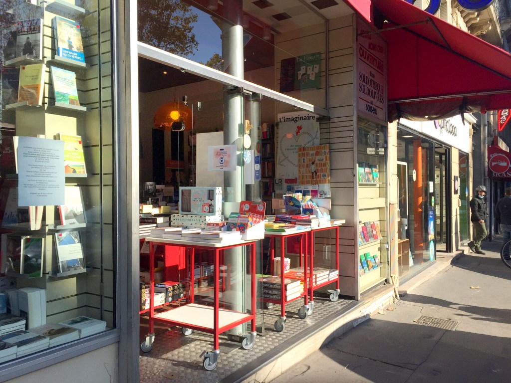 Bookstore in Paris with display tables blocking the entrance during Covid