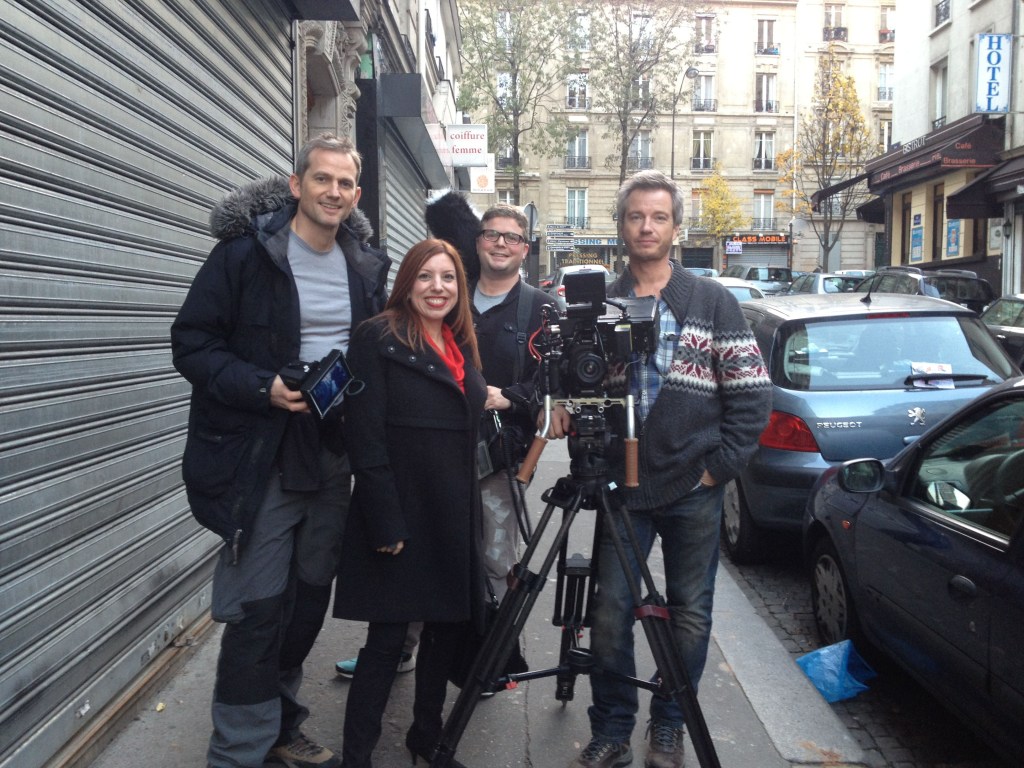 Author Lisa Anselmo surrounded by the crew of House Hunters International during the filming of her episode.