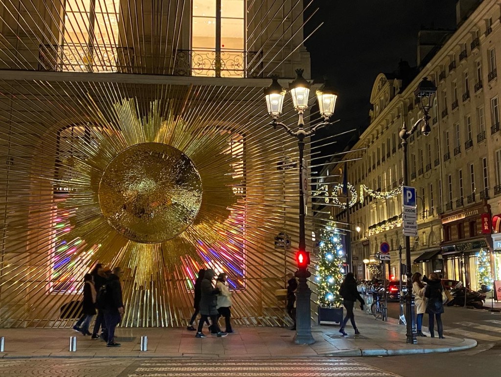 Louis Vuitton with large sun decoration on its facade