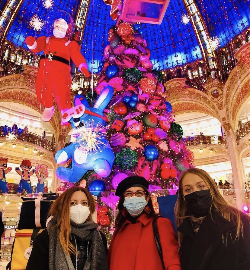 Author Lisa Anselmo, Real Estate Expert Adrian Leeds, and April Pett of April in Paris Tours in front of the tree at Galeries Lafayette